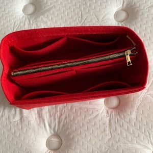Woman’s medium Louis Vuitton hand bag inserts